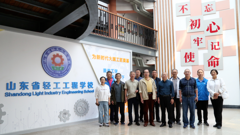 青岛市李沧区片老教育工作者协会到山东省轻工工程学校参观调研